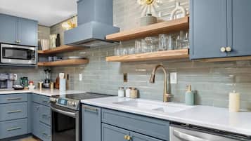 Fridge, oven, cookware/dishes/utensils