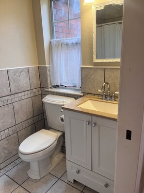 Hair dryer, towels, soap, toilet paper