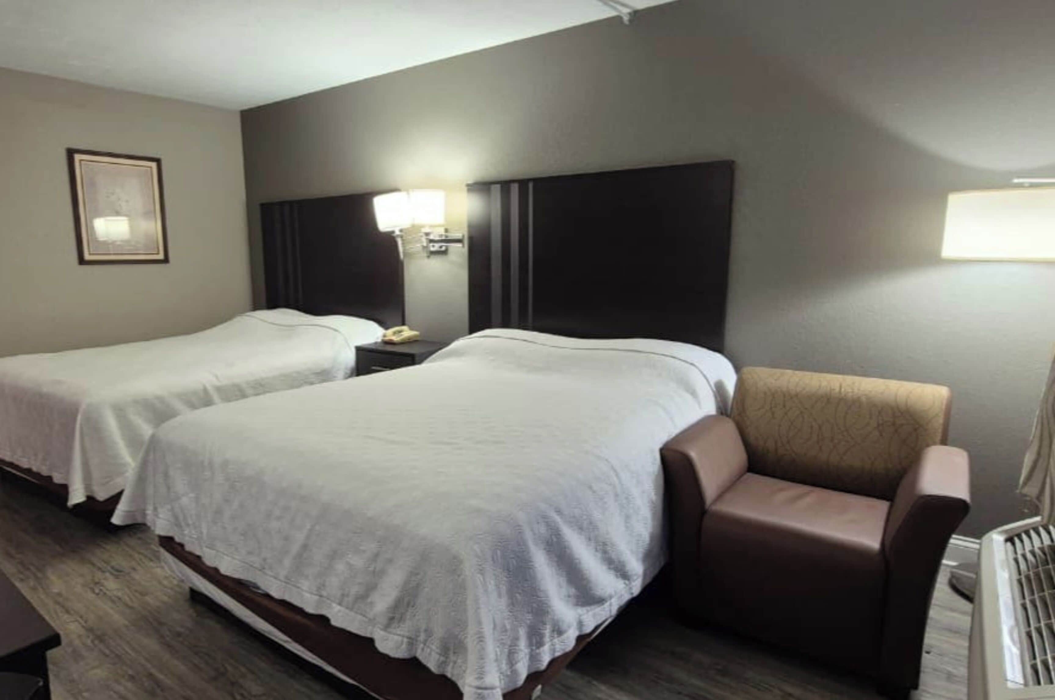 Room, 2 Queen Beds, Non Smoking | Iron/ironing board, free WiFi, bed sheets