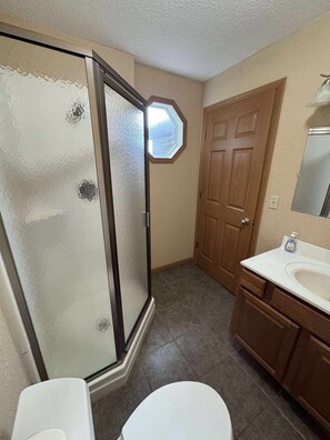 Shower, towels, toilet paper