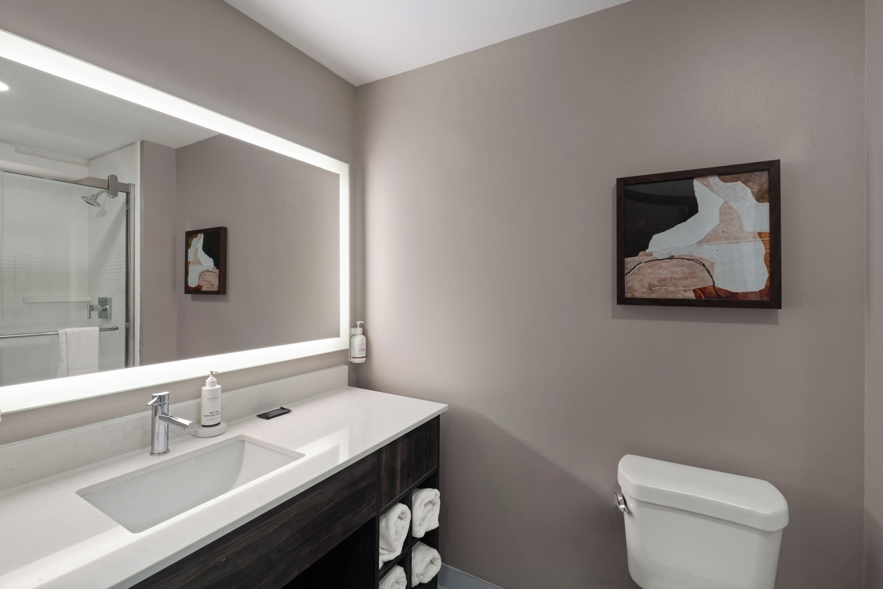 Combined shower/tub, hair dryer, towels, soap