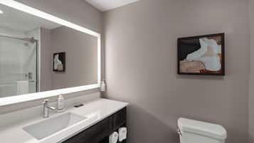 Combined shower/tub, hair dryer, towels, soap