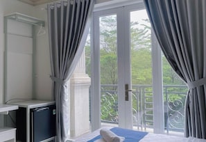 Double Room, Balcony | Iron/ironing board, free WiFi