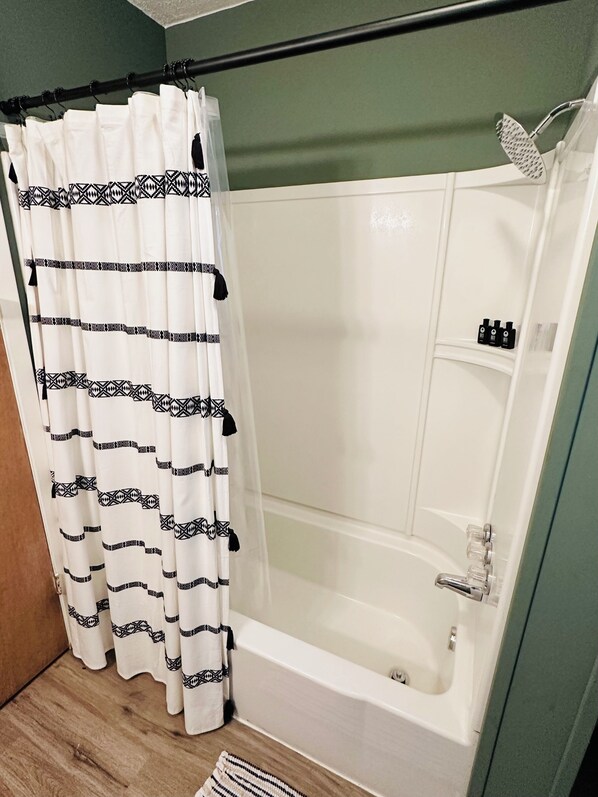 Hair dryer, towels, soap, shampoo