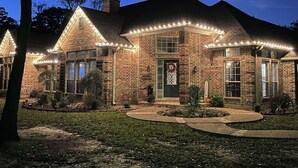 A brick house with a wrap-around porch, a front door with a wreath, and a number "4584" on the wall. - Beautiful Custom 4 bed with pool home with 3 acres. Private spacious backyard. (Campbell)
