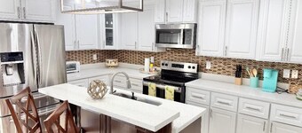 GORGEOUS 3/2.5 NEWER HOME WITH COURTYARD, LANDSCAPPED, Outside barbecue area.