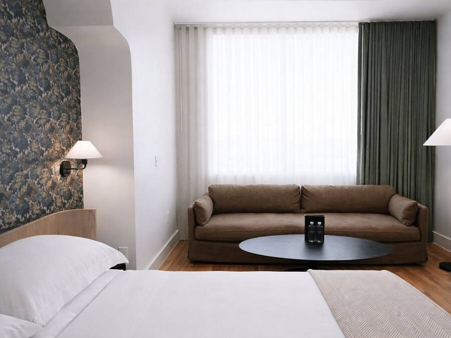 Premium bedding, down comforters, memory foam beds, minibar