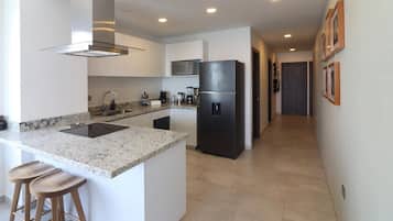 Microwave, coffee/tea maker, cookware/dishes/utensils