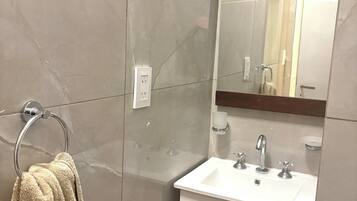 Hair dryer, towels, soap, shampoo