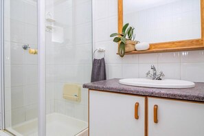 Hair dryer, towels, soap, shampoo