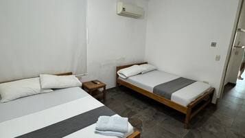 Deluxe Triple Room, Balcony | Laptop workspace, free WiFi