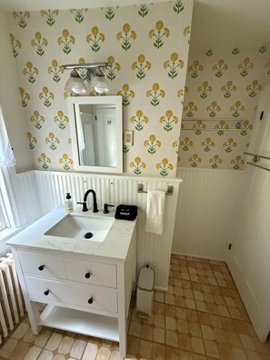 Eco-friendly toiletries, hair dryer, towels, soap