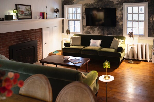 Smart TV, fireplace, foosball, books