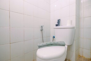 Standard Apartment | Bathroom - Simple And Cozy Living Studio At Dramaga Tower Apartment (Dramaga)