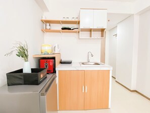 スタンダード アパートメント | 専用キッチン | 冷蔵庫、コンロ、調理器具と食器