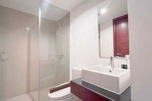 Standard Apartment | Bathroom - Modern Studio At Apartment Tamansari Tera Residence (Bandung)