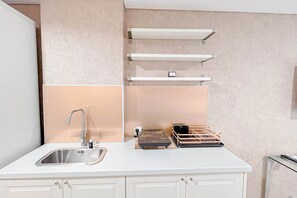 Apartamento standard | Cozinha privada | Talheres/pratos/utensílios de cozinha