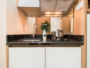 Standard Apartment | Private kitchen - Scandinavian Modern Studio Apartment At Springhill Terrace Residence (Jakarta)