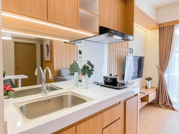 Private kitchen - Scandinavian Minimalist 2Br At Meikarta Apartment (Cikarang)
