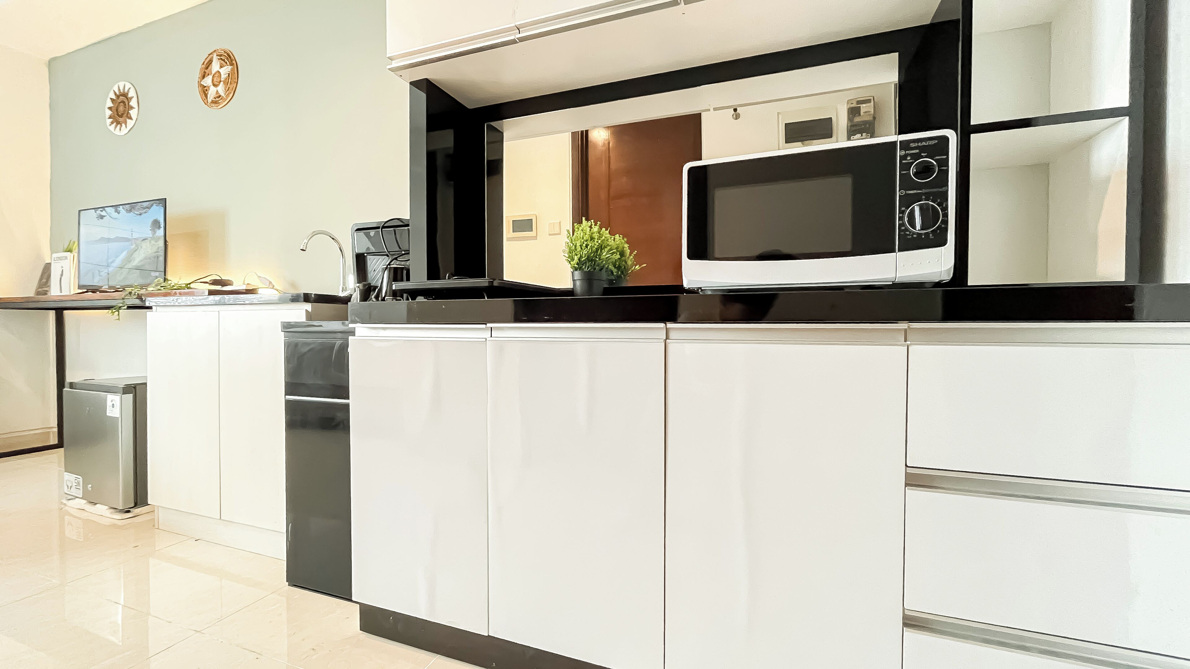 Apartment | Private kitchen | Microwave, stovetop, cookware/dishes/utensils