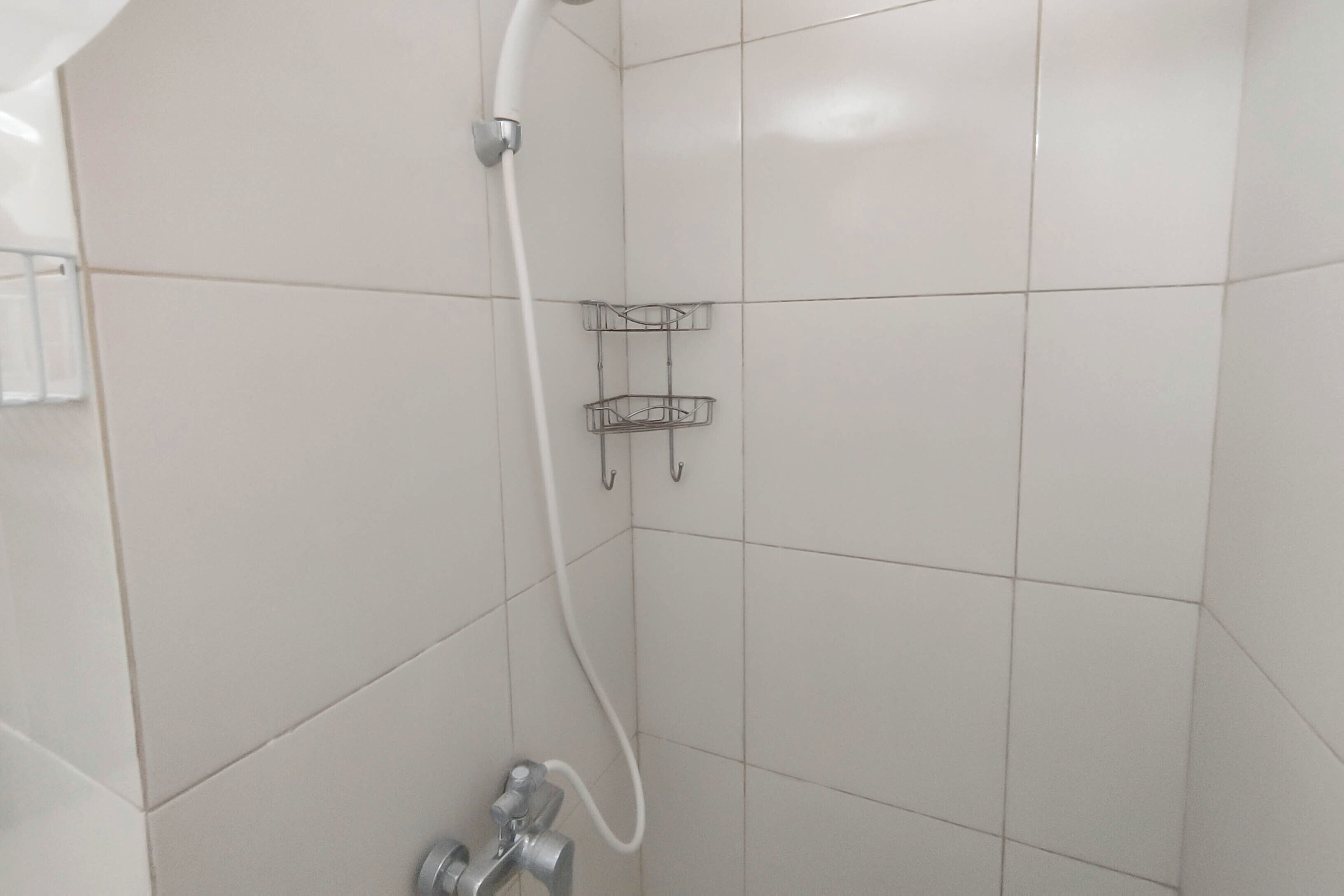 Apartemen | Kamar mandi | Shower, perlengkapan mandi gratis,  dan handuk