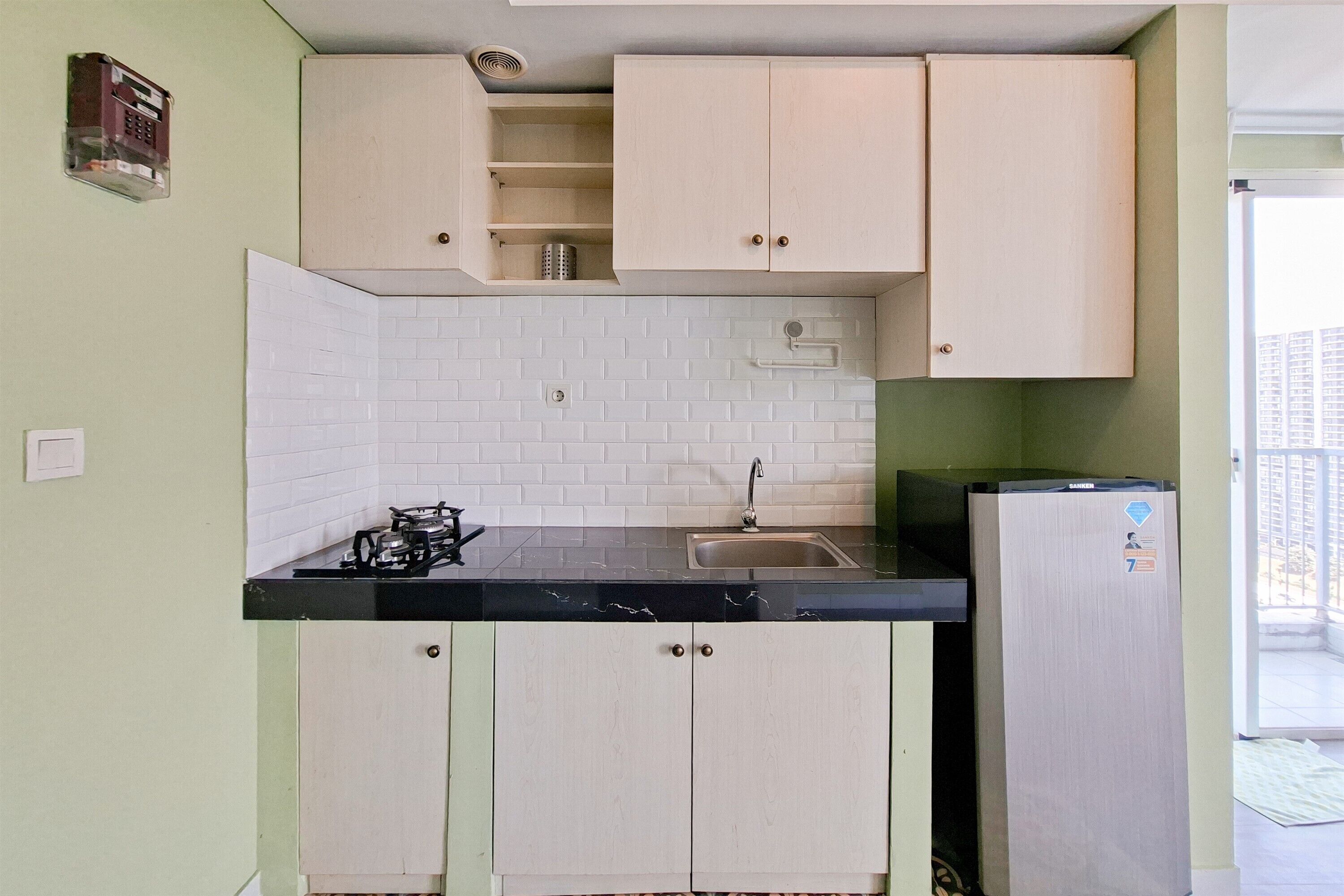 Apartamento | Cocina privada | Frigorífico, placa de cocina y utensilios de cocina