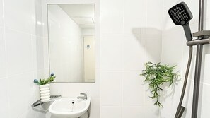 Apartment | Bathroom | Shower, free toiletries, towels - Minimalist And Cozy 2Br Apartment Tokyo Riverside Pik 2 Near Tokyo Hub (Teluknaga)