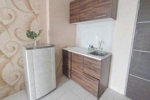 Apartment | Private kitchen | Fridge, stovetop, cookware/dishes/utensils