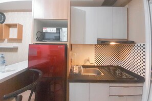 Apartment | Private kitchen | Fridge, stovetop, cookware/dishes/utensils
