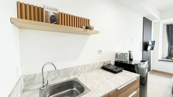 Apartment | Private kitchen | Fridge, stovetop, cookware/dishes/utensils