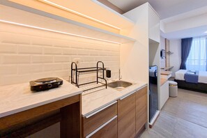 Appartamento | Cucina privata | Frigorifero, piano cottura, pentole/stoviglie/utensili