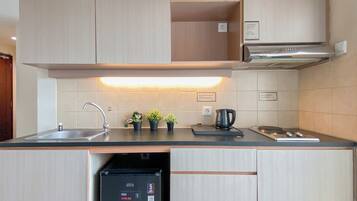 Apartment | Private kitchen | Fridge, stovetop, cookware/dishes/utensils