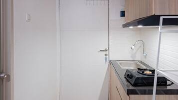 Apartment | Private kitchen | Fridge, stovetop, cookware/dishes/utensils