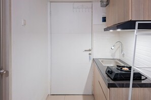 Apartment | Private kitchen | Fridge, stovetop, cookware/dishes/utensils