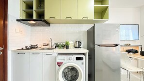 Apartment | Private kitchen | Fridge, stovetop, cookware/dishes/utensils