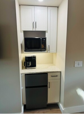 Fridge, microwave, coffee/tea maker, toaster