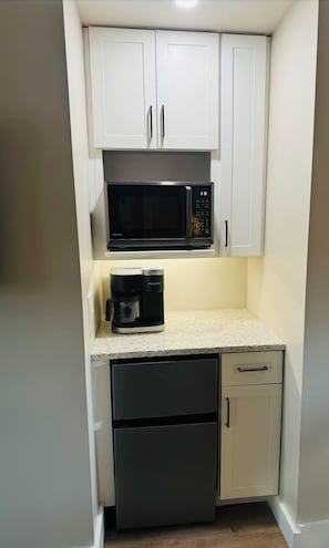 Fridge, microwave, coffee/tea maker, toaster