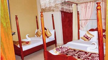 Twin Room, City View | In-room safe, desk, iron/ironing board, free WiFi