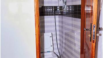Comfort Single Room, City View | Bathroom | Shower, slippers, towels, soap