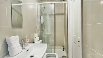 Hair dryer, towels, soap, toilet paper