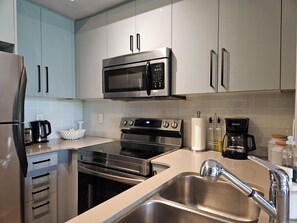 Fridge, microwave, dishwasher, coffee/tea maker