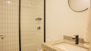 Apartment, 1 Queen Bed, City View | Bathroom | Free toiletries, hair dryer, towels, soap