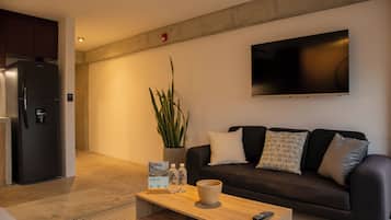 Apartamento, 1 cama de matrimonio, vistas a la ciudad | Zona de estar