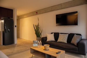 Căn hộ, 1 giường cỡ queen, quang cảnh thành phố | Khu phòng khách