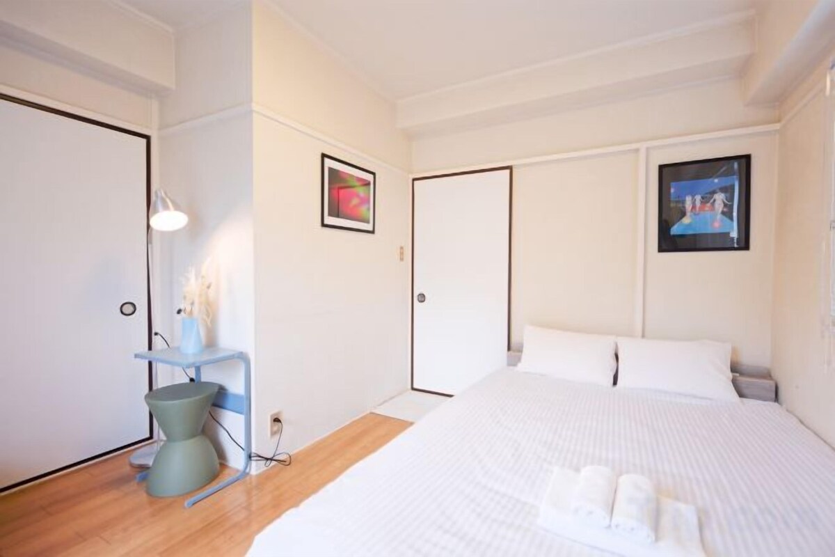 Desk, blackout curtains, iron/ironing board, bed sheets