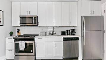 Executive Apartment, 3 Bedrooms | Private kitchen | Fridge, microwave, oven, stovetop