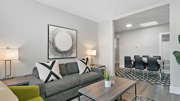 Executive Apartment, 3 Bedrooms | Living area | 55-inch TV with digital channels, streaming services