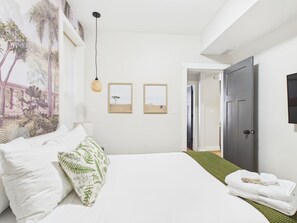 2 bedrooms, desk, iron/ironing board, travel crib