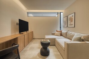 Luxury Apartment, 1 Bedroom | Living room | 55-inch Smart TV with digital channels
