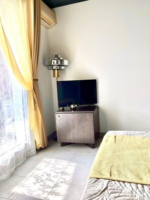 1 habitación, tabla de planchar con plancha, wifi y ropa de cama 